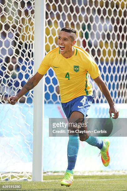 Day 12 Marquinhos of Brazil celebrates after scoring during the Brazil Vs Honduras Men's Semifinal match at Maracana Stadium on August 17, 2016 in...