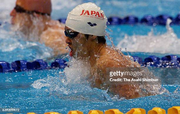 Kosuke Kitajima of Japan competes in the Men's 100m Breaststroke Final during the Sydney Olympics at the Sydney International Aquatic Centre on...