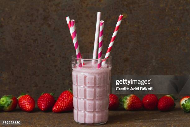 strawberry smoothie - straw stock pictures, royalty-free photos & images