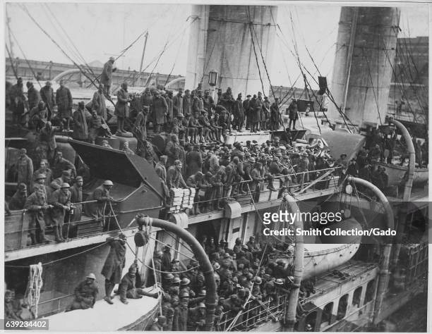 Crowded along the decks and balconies of the French liner La France, dozens of heroic and brave African American men in the 15th Infantry return to...