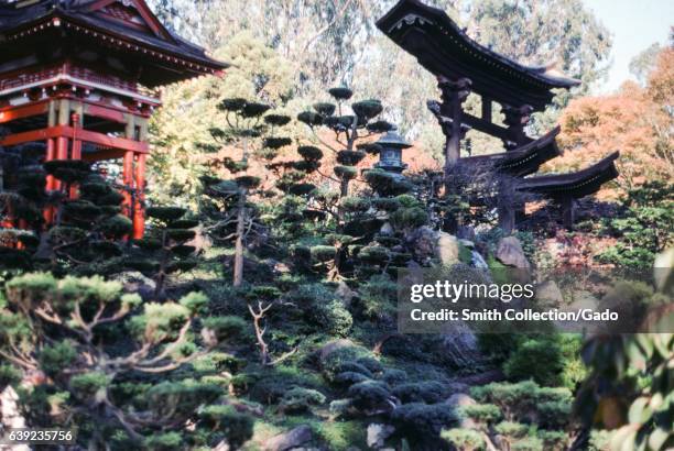 Temple and trees in the Hagiwara Japanese Tea Garden in Golden Gate Park in San Francisco, California, 1978. .