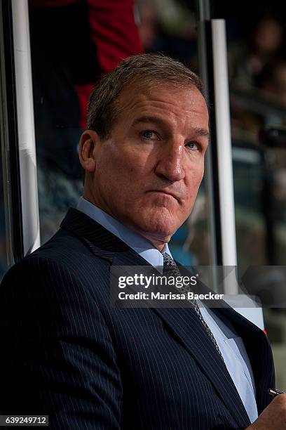 Tim Hunter, head coach of the Moose Jaw Warriors stands on the bench against the Kelowna Rockets on January 18, 2017 at Prospera Place in Kelowna,...