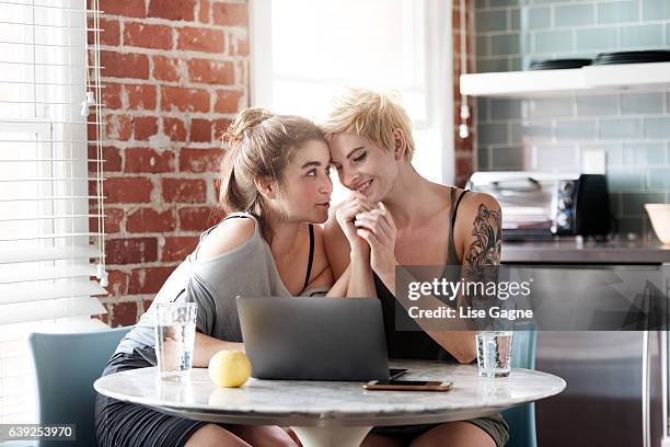 young women couple - lise gagne stock pictures, royalty-free photos & images