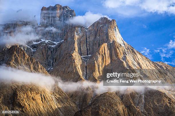 morning clouds over trango castle, khoburtse, k2 base camp trek, central karakoram national park, gilgit-baltistan, pakistan - trango towers stock pictures, royalty-free photos & images