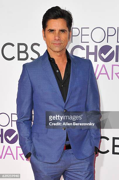 Actor John Stamos arrives at People's Choice Awards 2017 at Microsoft Theater on January 18, 2017 in Los Angeles, California.