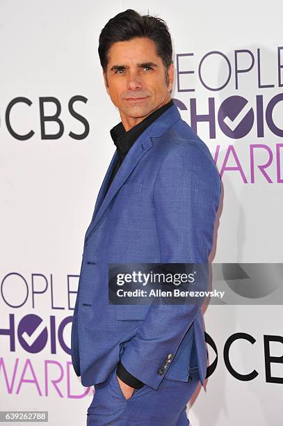 Actor John Stamos arrives at People's Choice Awards 2017 at Microsoft Theater on January 18, 2017 in Los Angeles, California.