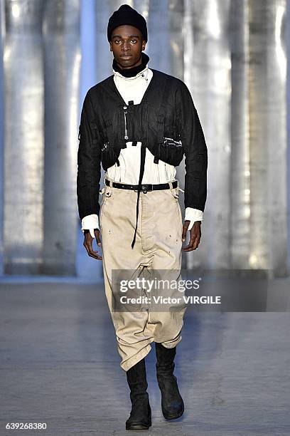 Model walks the runway during the Boris Bidjan Saberi Menswear Fall/Winter 2017-2018 show as part of Paris Fashion Week on January 19, 2017 in Paris,...