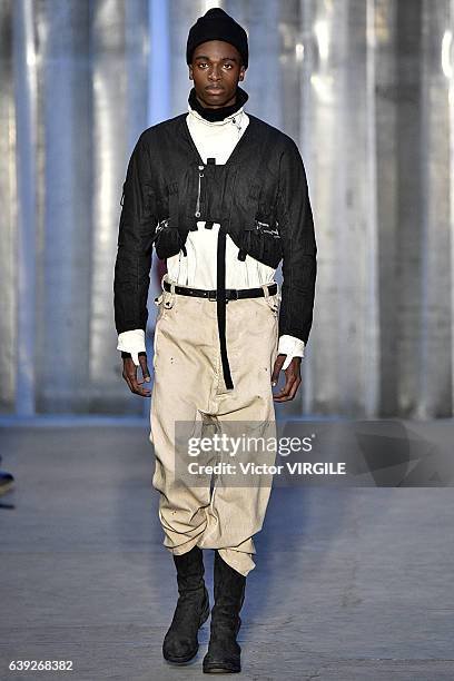 Model walks the runway during the Boris Bidjan Saberi Menswear Fall/Winter 2017-2018 show as part of Paris Fashion Week on January 19, 2017 in Paris,...