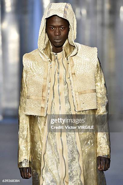 Model walks the runway during the Boris Bidjan Saberi Menswear Fall/Winter 2017-2018 show as part of Paris Fashion Week on January 19, 2017 in Paris,...