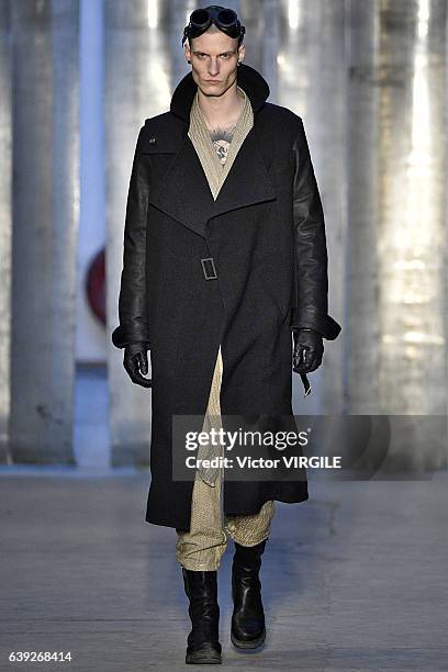 Model walks the runway during the Boris Bidjan Saberi Menswear Fall/Winter 2017-2018 show as part of Paris Fashion Week on January 19, 2017 in Paris,...