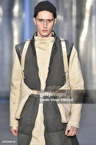 Model walks the runway during the Boris Bidjan Saberi Menswear Fall/Winter 2017-2018 show as part of Paris Fashion Week on January 19, 2017 in Paris,...