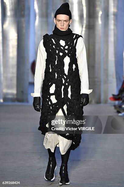 Model walks the runway during the Boris Bidjan Saberi Menswear Fall/Winter 2017-2018 show as part of Paris Fashion Week on January 19, 2017 in Paris,...