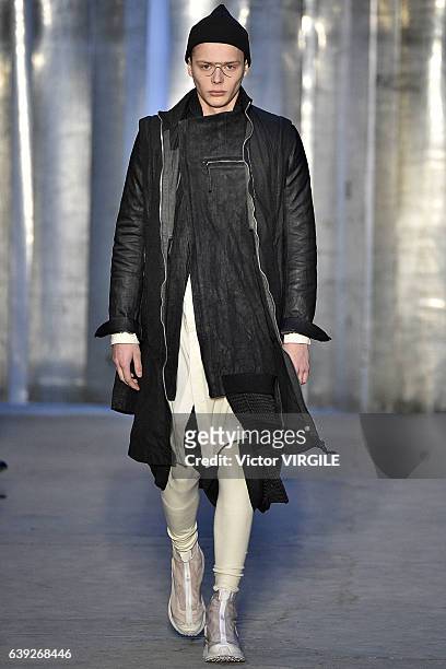 Model walks the runway during the Boris Bidjan Saberi Menswear Fall/Winter 2017-2018 show as part of Paris Fashion Week on January 19, 2017 in Paris,...
