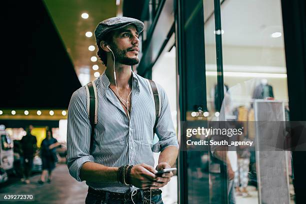 taking a night walk - car listening to music imagens e fotografias de stock