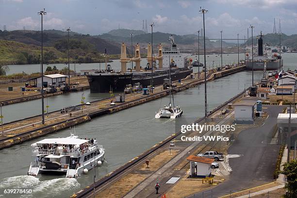 Gatun Lock in the Panama Canal December 1999 before United States returned sovereignty to Panama. The Panama Canal locks is a lock system that lifts...