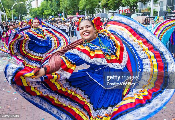 Participants in a parde during the 23rd International Mariachi & Charros festival in Guadalajara Mexico.