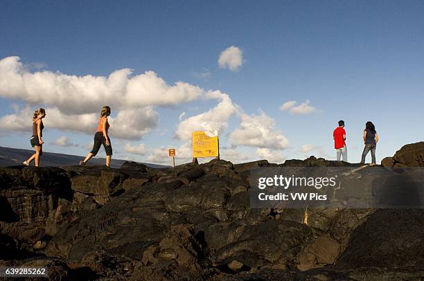 Black lava mountains near the coast and highway Chain of Crater Road. Hawai'i Volcanoes National Park. Big Island. Hawaii. Lava fields and the...