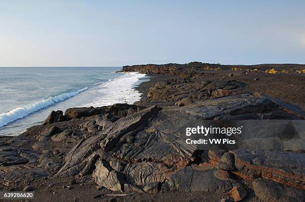 Pahoehoe Lava from Kilauea Eruption at Sunrise, Kaimu Beach at Kalapana, Black Sand Beach, Kaimu Bay, Puna District, Big Island of Hawaii.