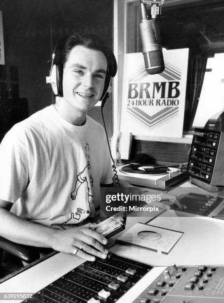 Disc Jockey Graham Torrington, who is sitting in for Breakfast Show host Les Ross during his two-week holiday. 22nd September 1988.