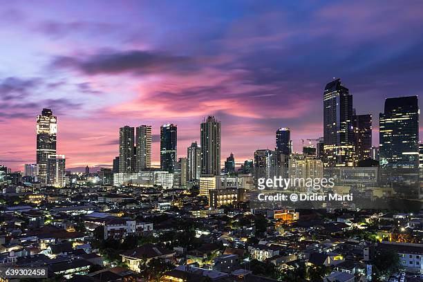 stunning sunrise over jakarta, indonesia capital city - jakarta stock pictures, royalty-free photos & images