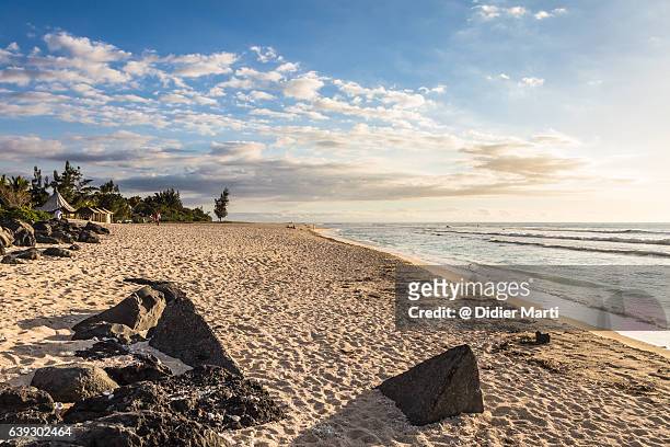 sunset over the beach in saint gilles les bains in the reunion island - la reunion stock pictures, royalty-free photos & images