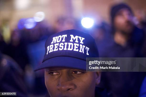 Protestor demonstrates before dawn near the National Mall before the inauguration of Donald Trump as the 45th President of the United States January...