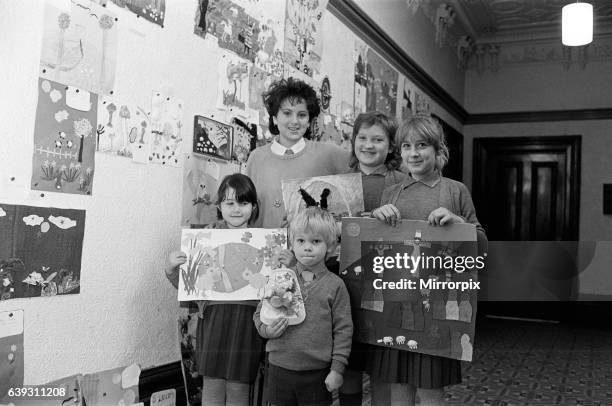 Mount School pupils show off their winning entries in the school's collage competition. They are : Amy Lodge, Iain Driver, Tamara Powell and Rebecca...