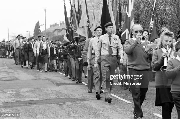 Over 300 Cubs, Scouts and Venture Scouts led by Paddock Youth Band, march through Honley to St Mary's Parish Church on St George's Day to renew their...