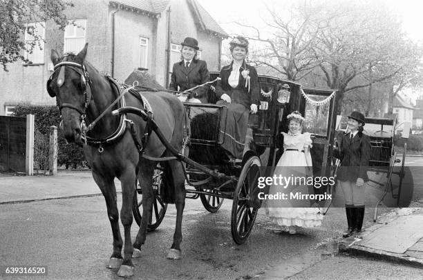 Liverpool May Queen, Carol Ann Cassidy aged 11, tastes the VIP treatment as Prince draws up before her home, l-r, Sue Tate, Susan Place and Jo...