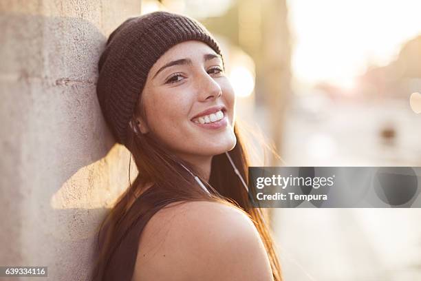 young beautiful spanish woman in the streets of barcelona. - girls of spain stock pictures, royalty-free photos & images