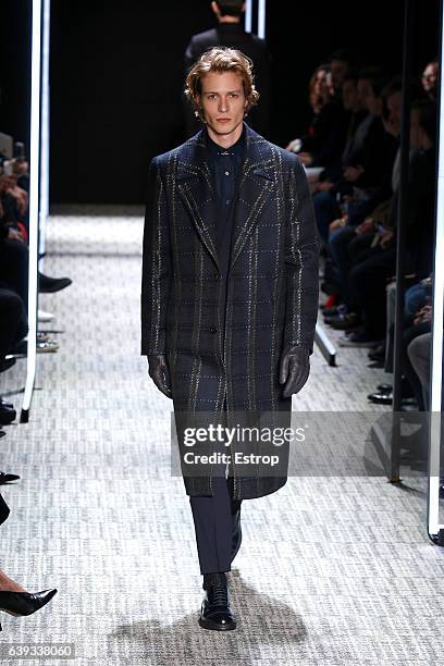 Model walks the runway during the Cerruti designed by Richard Nicoll Menswear Fall/Winter 2017-2018 show as part of Paris Fashion Week on January 20,...