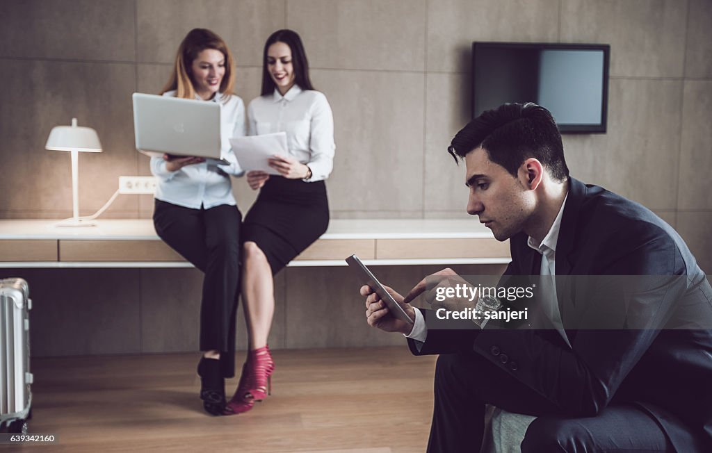 Business People Working in a Hotel Room