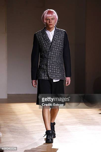 Model walks the runway during the Comme Des Garcons Homme Plus Menswear Fall/Winter 2017-2018 show as part of Paris Fashion Week on January 20, 2017...