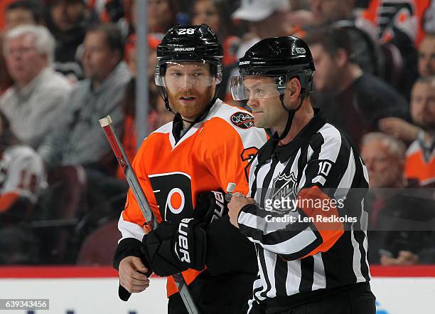 Claude Giroux and the Philadelphia Flyers looks on following a call by Referee Kyle Rehman during their game against the Vancouver Canucks on January...