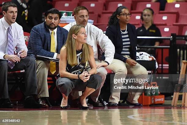 Head coach Kim Barnes Arico of the Michigan Wolverines looks on during a women's college basketball game against the Maryland Terrapins at the...