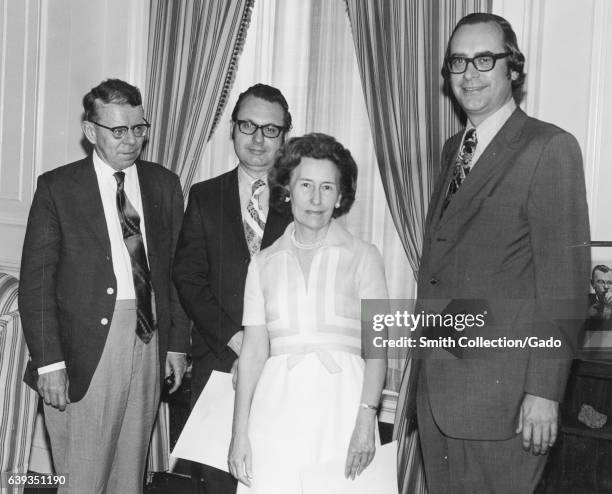 Historians Dr Edward G Campbell, Robert M Kvasnicka, and Jane F. Smith stand with Archivist James B Rhoads during the Commendable Service Award...