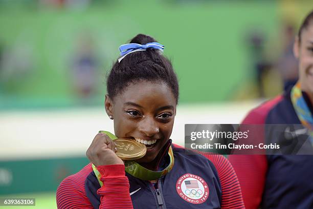 Gymnastics - Olympics: Day 6 Simone Biles of the United States with her gold medal in the Artistic Gymnastics Women's Individual All-Around Final at...