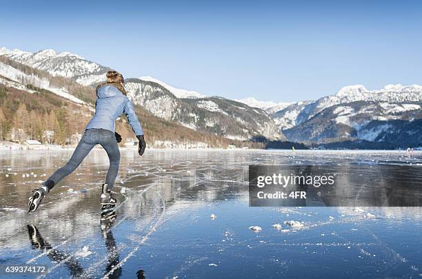 ice skating, frozen lake grundlsee, austria - grundlsee stock pictures, royalty-free photos & images