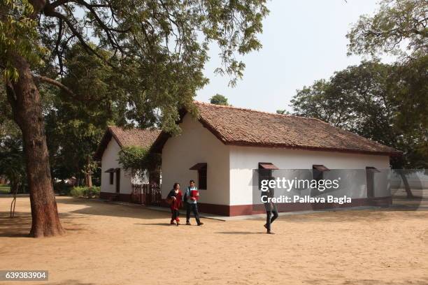 January 10. Hriday Kutir, a view from the rear the spartan home that the Mahatma used, made of tiles and bricks with large windows.The unusually...
