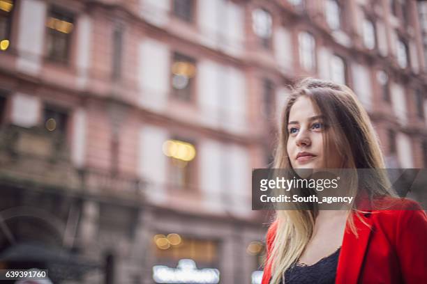 young businesswoman - business woman in red suit jacket stock pictures, royalty-free photos & images