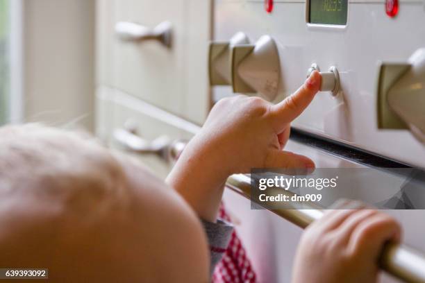 this button - baby hands pointing stock pictures, royalty-free photos & images