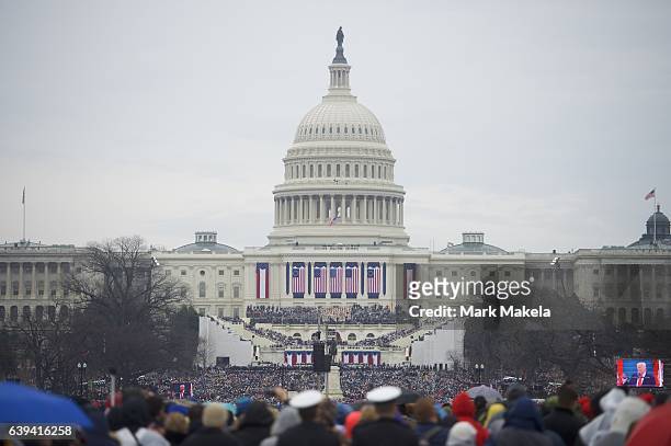 Supporters arrive before the inauguration of Donald Trump being sworn in as the 45th President of the United States in front of the U.S. Capitol...