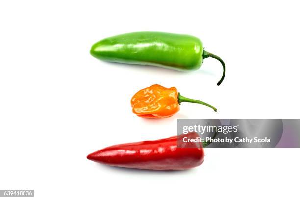 three spicy peppers - habanero stock pictures, royalty-free photos & images