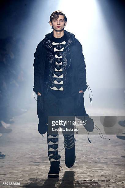 Model walks the runway during the White Mountaineering designed by Yosuke Aizawa Menswear Fall/Winter 2017-2018 show as part of Paris Fashion Week on...