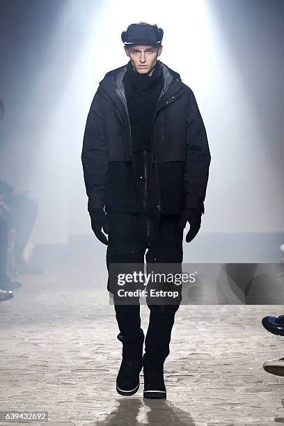 Model walks the runway during the White Mountaineering designed by Yosuke Aizawa Menswear Fall/Winter 2017-2018 show as part of Paris Fashion Week on...