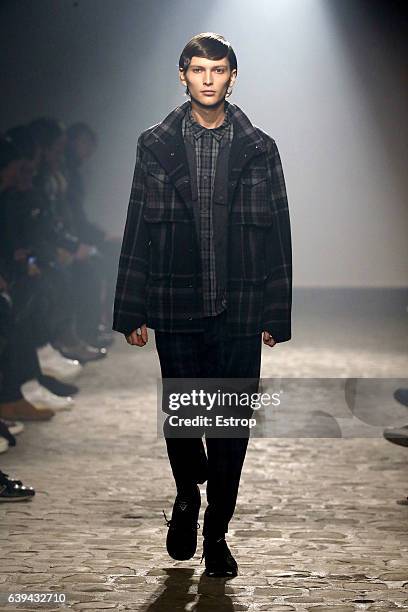 Model walks the runway during the White Mountaineering designed by Yosuke Aizawa Menswear Fall/Winter 2017-2018 show as part of Paris Fashion Week on...