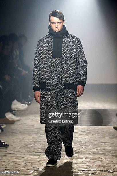 Model walks the runway during the White Mountaineering designed by Yosuke Aizawa Menswear Fall/Winter 2017-2018 show as part of Paris Fashion Week on...