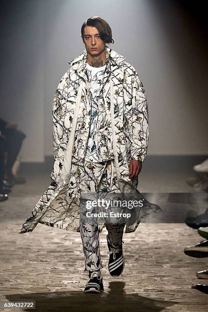 Model walks the runway during the White Mountaineering designed by Yosuke Aizawa Menswear Fall/Winter 2017-2018 show as part of Paris Fashion Week on...