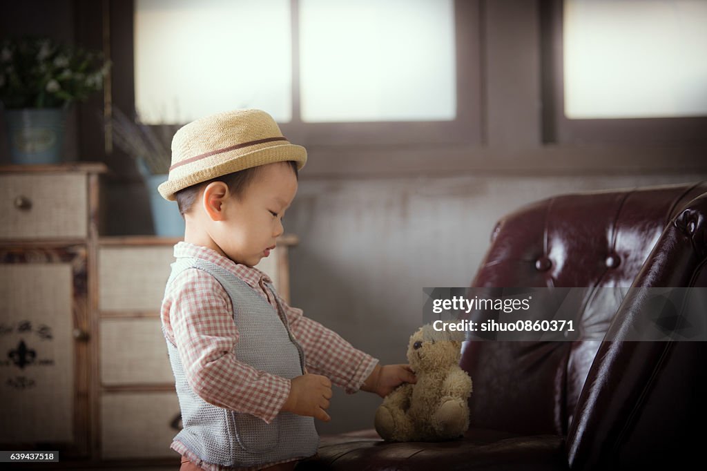 Boy and teddy bear