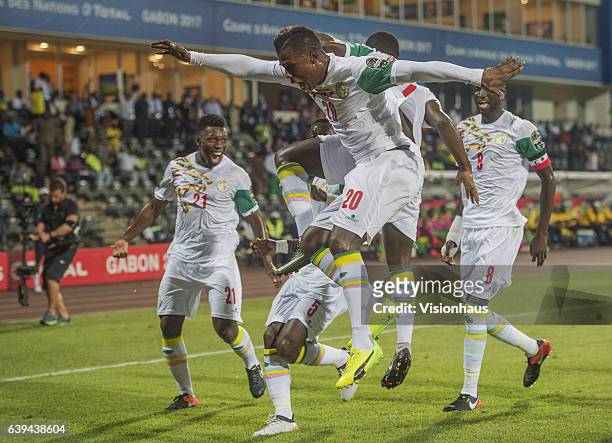 Keita Balde and the Senegal team celebrate Henri Saivet's goal during the Group B match between Senegal and Zimbabwe at Stade Franceville on January...